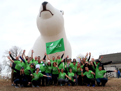 SECU Volunteers cheering at the 2020 Polar Bear Plunge benefiting Maryland Special Olympics.