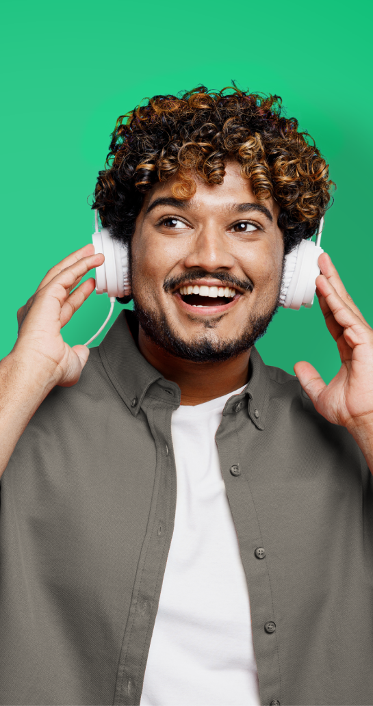 Man wearing headphones and smiling