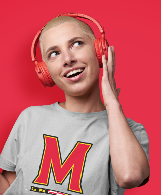 Student listening to headphones.