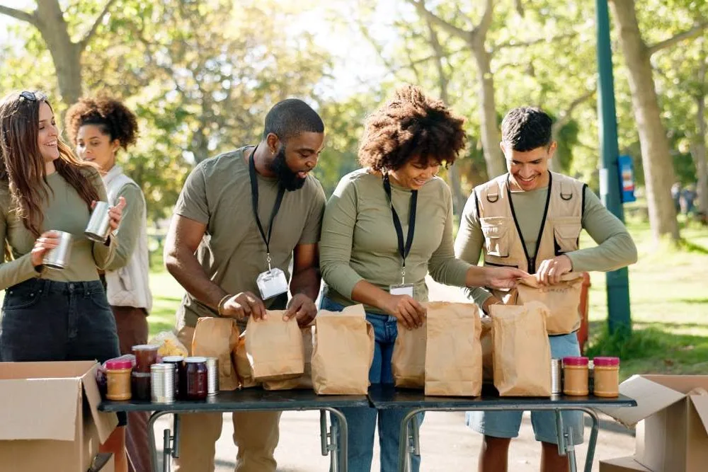 group of college students prepare brock paper bag lunches