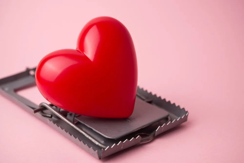 red heart in a mouse trap