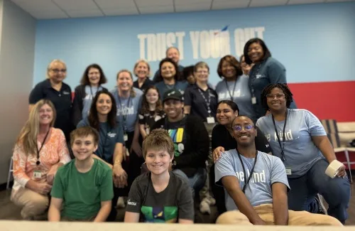 Group of SECU employees posing together for a photo