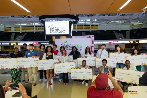 SECU MD Foundation scholarship winners receive checks at ceremony at SECU Arena